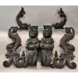 A decorative collection of 19th century carved oak and other furniture mounts / adornments to