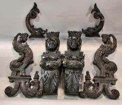 A decorative collection of 19th century carved oak and other furniture mounts / adornments to