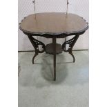 A pie crust top table together with Indian octagonal table