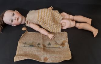Early 20th century German bisque head doll 'Melitta' by Edward Edelmann ' with closing blue eyes,