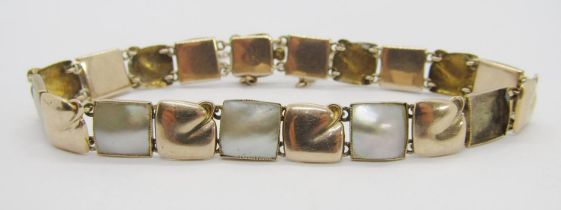 Murrle Bennett & Co. 9ct bracelet set with mother of pearl panels, 8.5g (af four panels vacant)