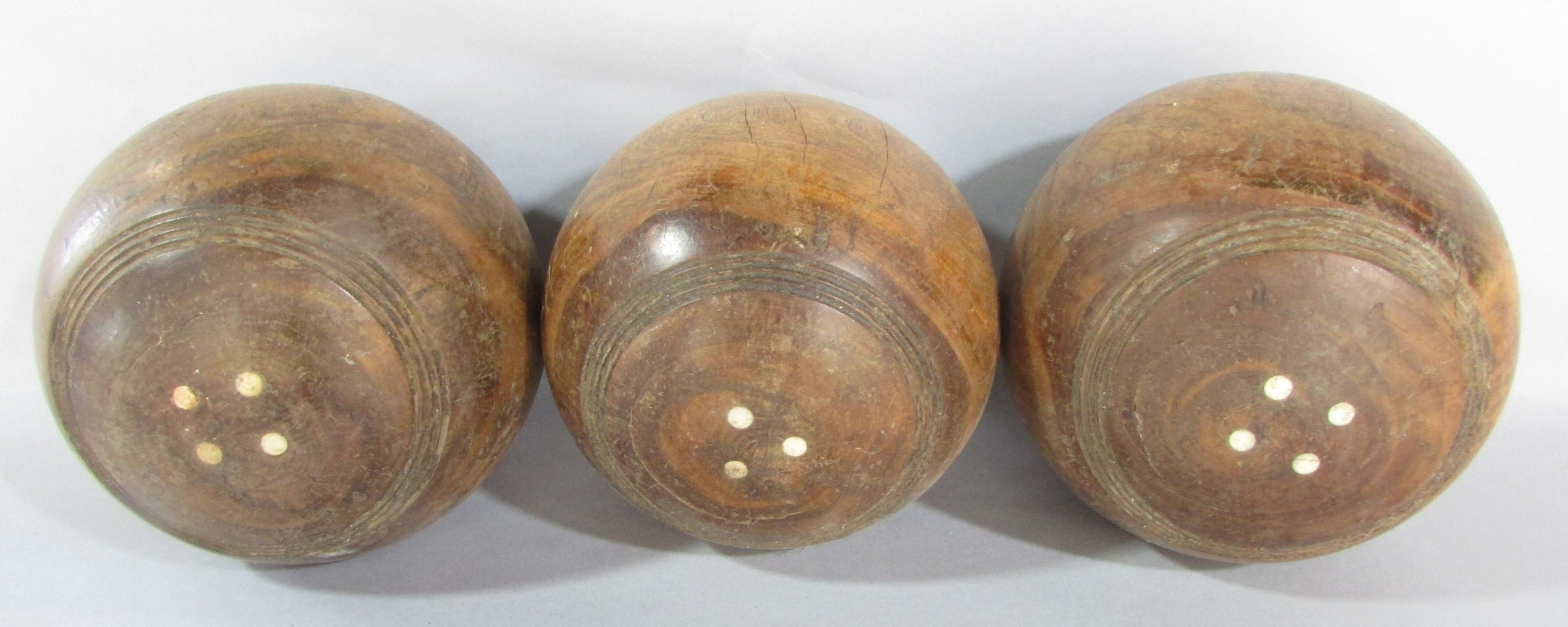 Eight vintage weighted wooden bowls. - Image 2 of 4