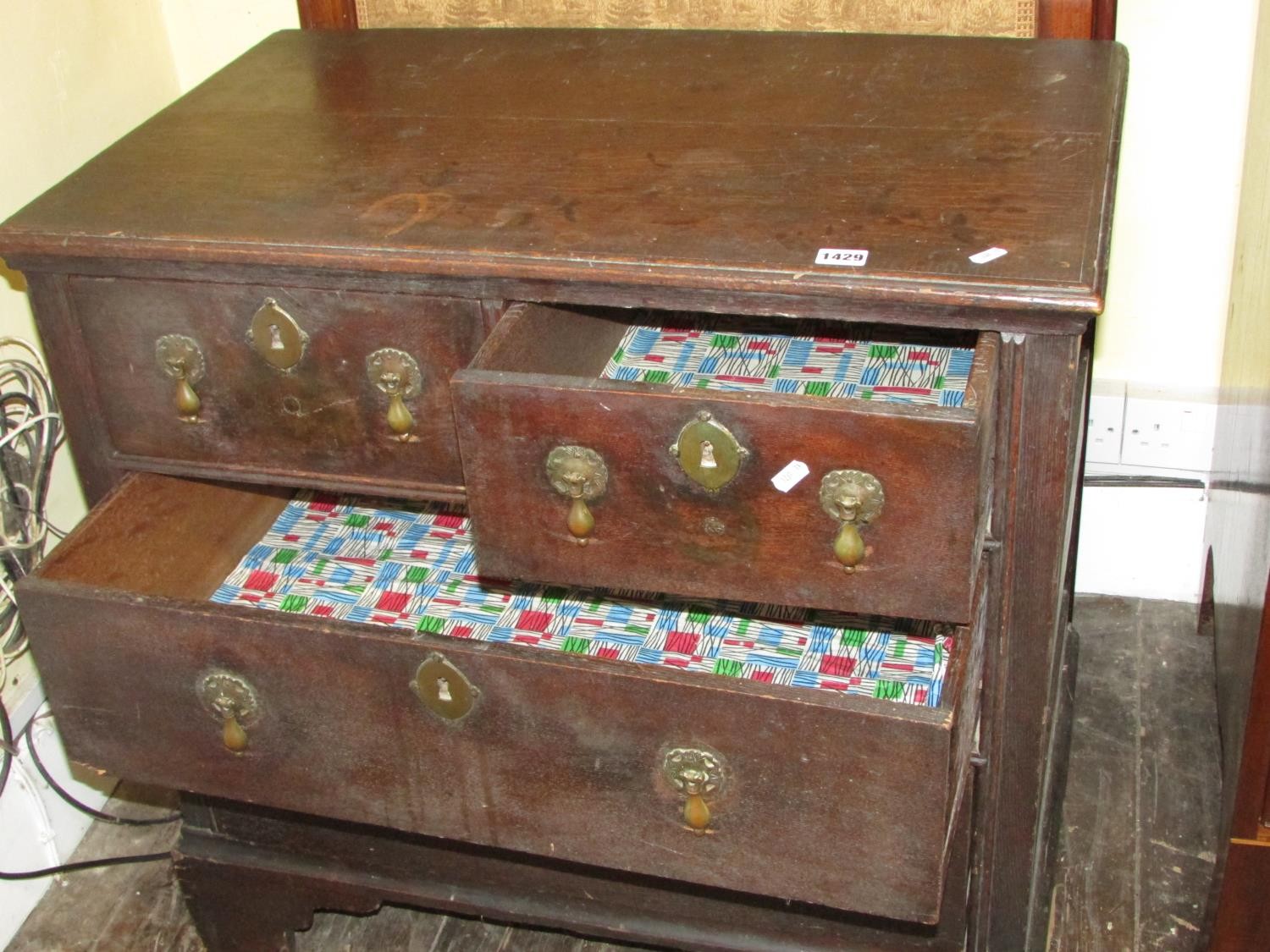 A small 18th century oak chest of two long and two drawers raised on bracket supports with pear drop - Image 3 of 4