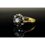 18ct sapphire and diamond cluster ring, centre diamond 0.20ct approx, size O/P, 4.7g