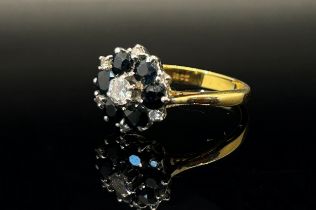 18ct sapphire and diamond cluster ring, centre diamond 0.20ct approx, size O/P, 4.7g