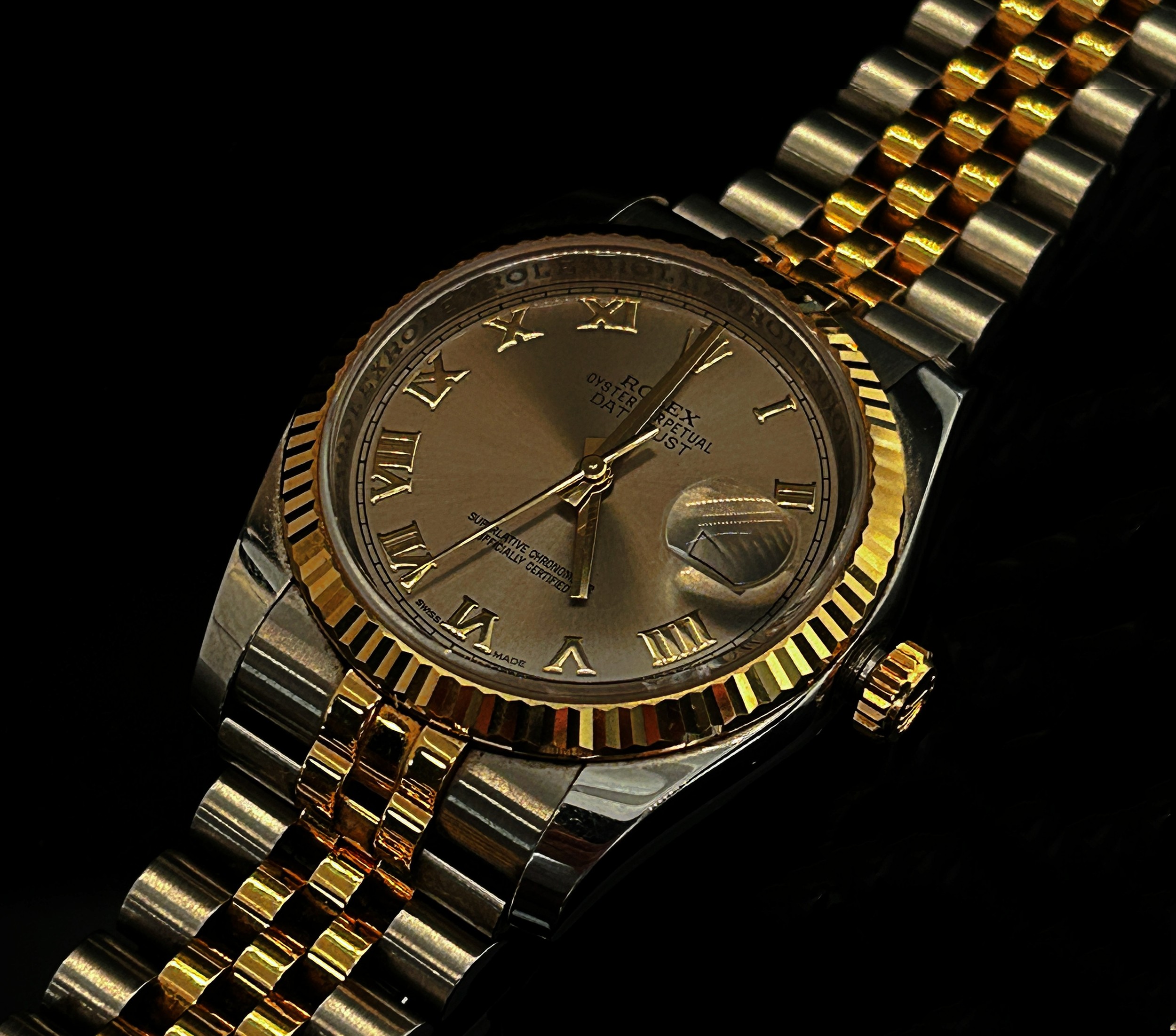 Rolex: An Oyster Perpetual Datejust wristwatch, complete with box and papers