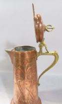 A WMF Art Nouveau Jugendstil copper and brass claret jug, stamped with an Ostrich and WMF (The F