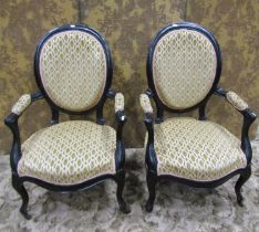 A pair of Victorian drawing room chairs with cameo back, upholstered finish