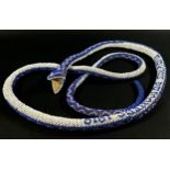 Military interest – A WWI Turkish POW beadwork snake in a white, blue and pink finish, 160cm long