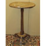 A simple Georgian countrymade occasional table in mixed woods, the oak top raised on a simple