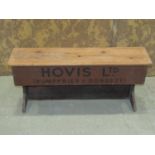 A vintage pine counter top enclosing a drawer with painted script 'Hovis Ltd' (Humphries &