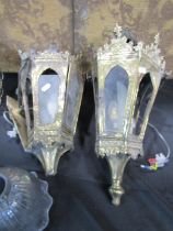 A pair of embossed brass tapering hexagonal wall lights, cut glass and brass hall lantern, pair of