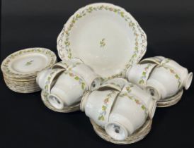 A Paragon tea service for twelve with repeating rosebud detail