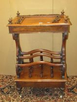 A Victorian walnut and figured walnut Canterbury watnot, raised on carved and pierced supports,