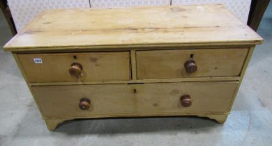 19th century stripped and waxed pine chest of one long and two short drawers, 102cm long x 53cm high