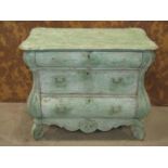 A small green painted and dry-scraped Dutch bombe chest of three drawers, 90cm wide x 50cm deep x