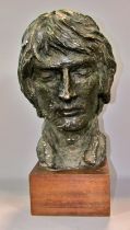 A late 20th century, 1970’s, plaster bust of a bearded man in a bronze patina paint finish, raised