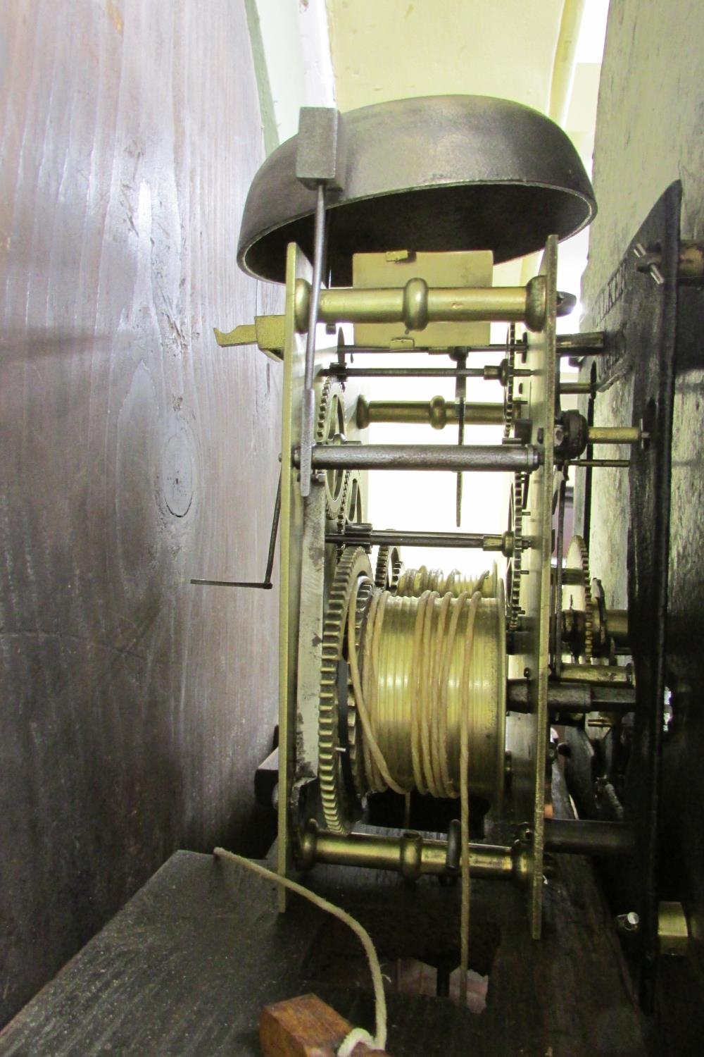 A 19th century oak longcase clock with heavy estate carving, the trunk detailing a knight fighting - Image 10 of 17