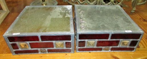 A pair of square leaded stained glass wall lamps of squared form, each measuring 13cm high, 27 x