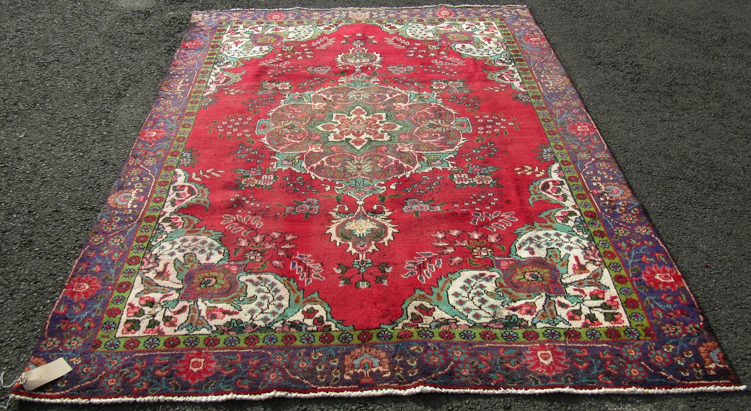 A vintage Persian Tabriz carpet with a multi coloured ground, 276cm x 189cm - Image 2 of 4
