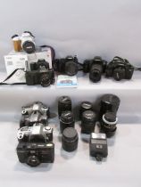 Nine Canon cameras models: EOS 80, EOS 1000F, EOS 3000V, EOS 500 N, EOS, RO AF35M, EOS 300 with