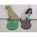 Two painted dummy boards depicting a Labrador and a Spaniel, each shaped to fit a dog bowl