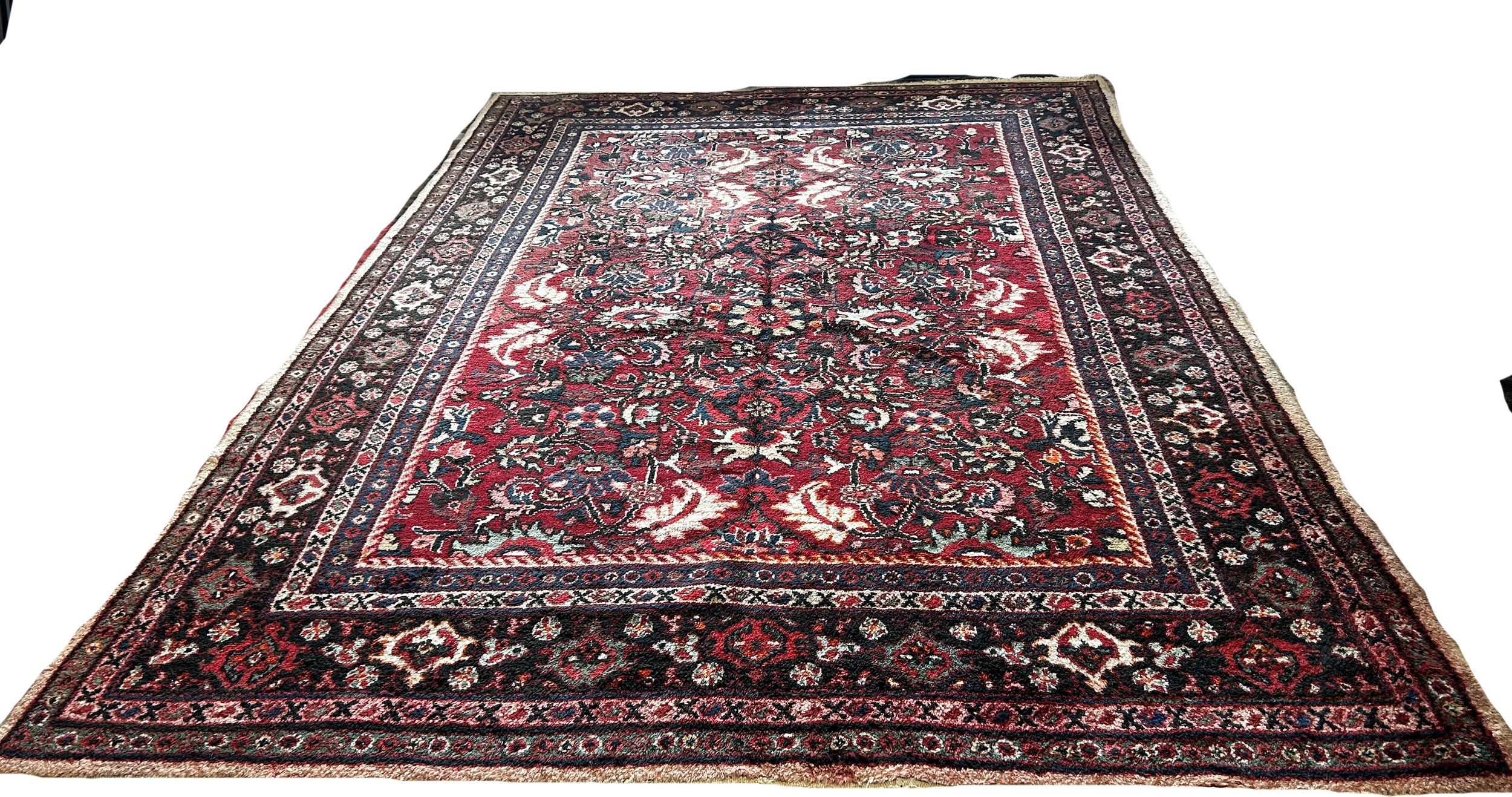 A Persian Hamadan type carpet with an all over floral pattern on a predominantly red ground, 290 x - Image 2 of 3