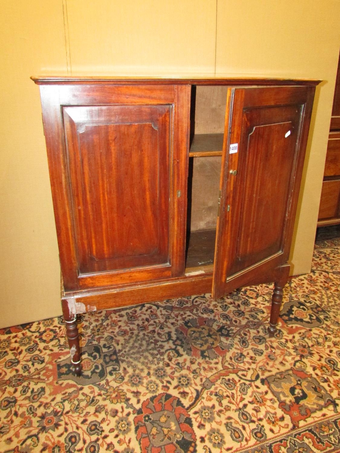 A Georgian satin wood cupboard enclosed by two fielded panelled doors, raised on an open - Image 2 of 4