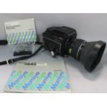 A Mamiya M645 box camera , M645 waist level finder and instruction booklet