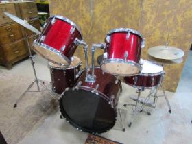 Five piece drum kit with maroon bands, chrome fittings together with cymbals, stool, etc
