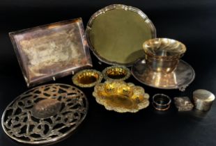 A mixed selection of silver plated tableware, including a salver, a glass cake plate with overlaid