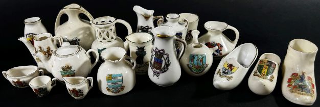 A collection of crested china including a number of military pieces, principally archaeological