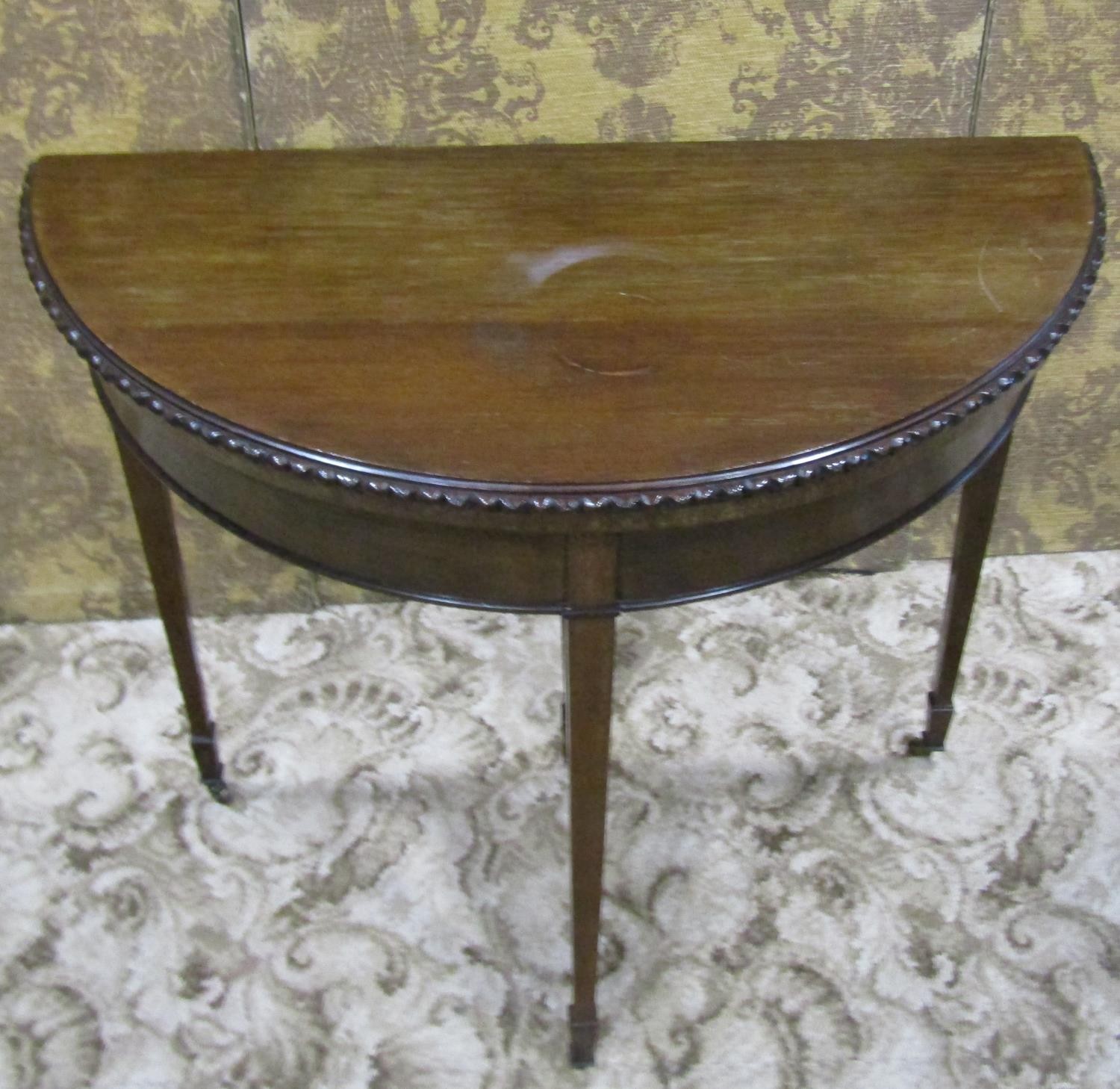 An Edwardian mahogany demi-lune fold over top card table in the Georgian style raised on square - Image 2 of 5