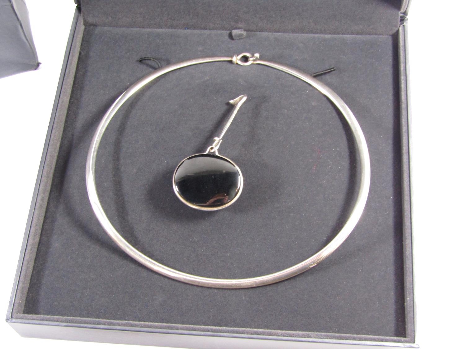 A Georg Jensen Viviana Torun silver pendant necklace, with removable onyx pendant, (models 410 and - Image 2 of 4