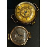 A 9ct yellow gold cased fob watch, with engraved dial populated with black Roman numerals,