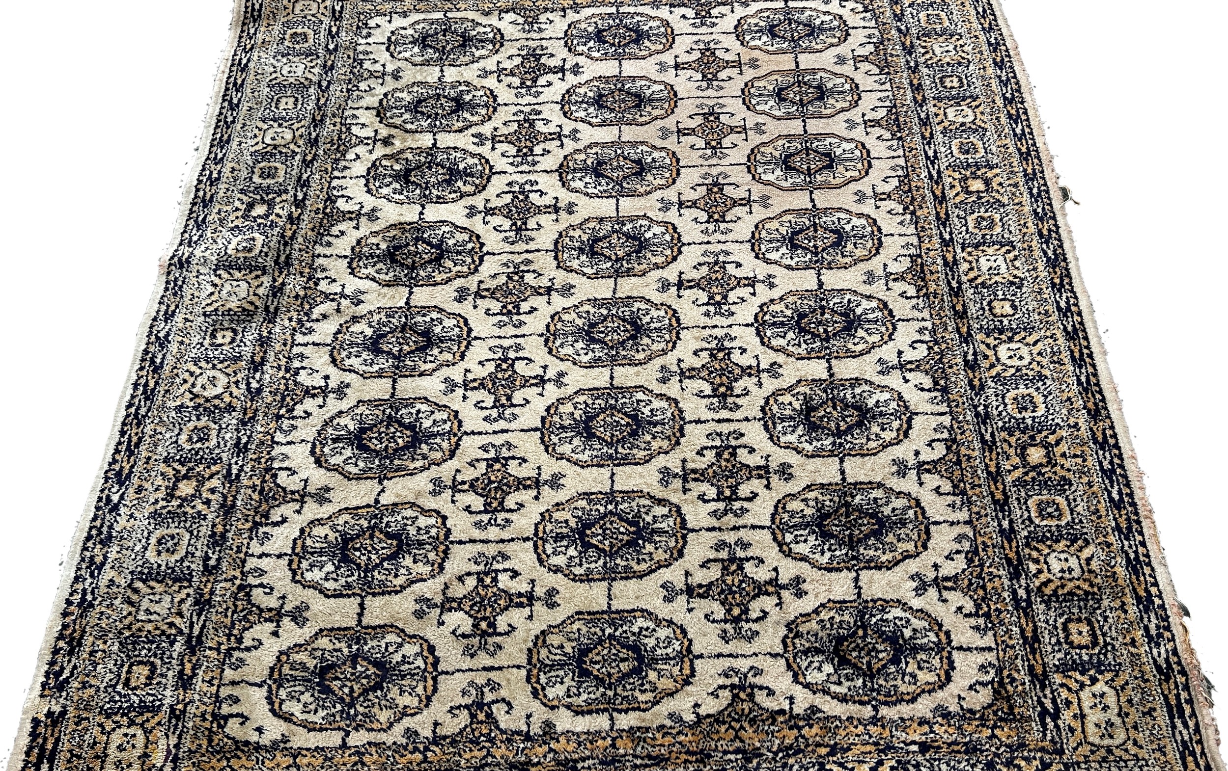 A Bokara style carpet, with three row of elephant foot blue guls on a beige ground, 185 x 130cm - Image 3 of 3