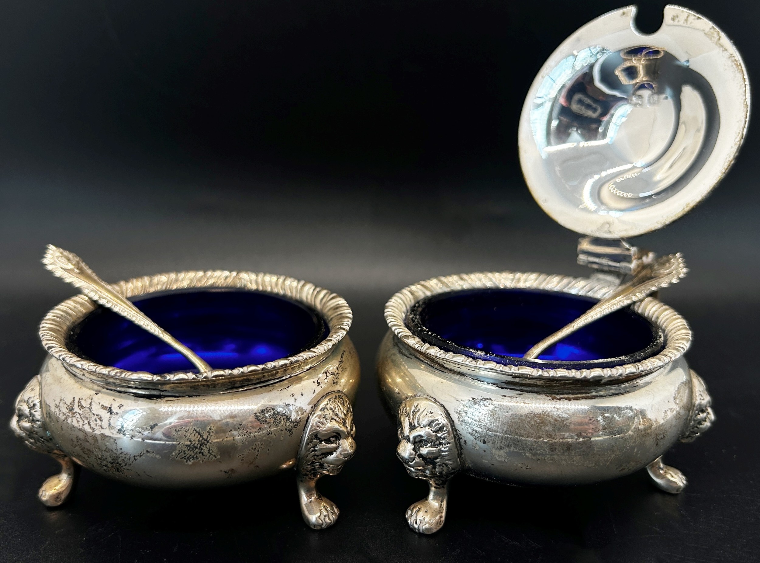 A silver three piece Georgian style condiment set, salt, pepper and mustard with two spoons and blue - Image 2 of 3