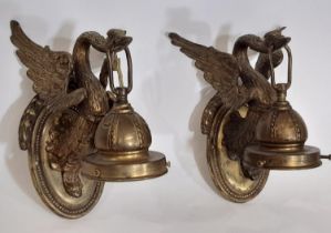 A pair of 19th century continental cast metal wall sconces / lamps, in the form of stylised swans,