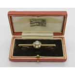 Antique 18ct bar brooch set with a diamond and multi-gem cluster, including an opal and cats eye