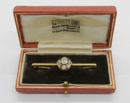 Antique 18ct bar brooch set with a diamond and multi-gem cluster, including an opal and cats eye