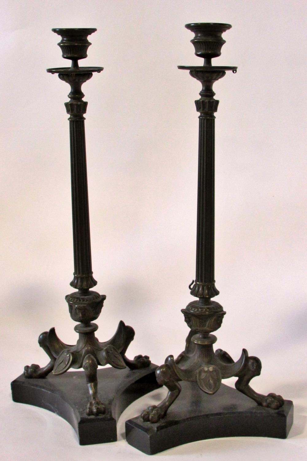 A pair of 19th century bronze candlesticks, in the form of tapering fluted columns raised on - Image 4 of 4