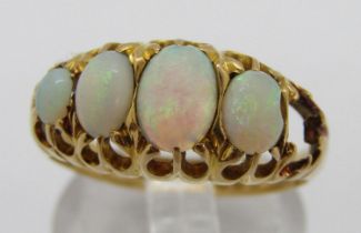18ct graduated opal ring, maker 'C&S', Birmingham 1904, size O, 3g (one stone vacant)
