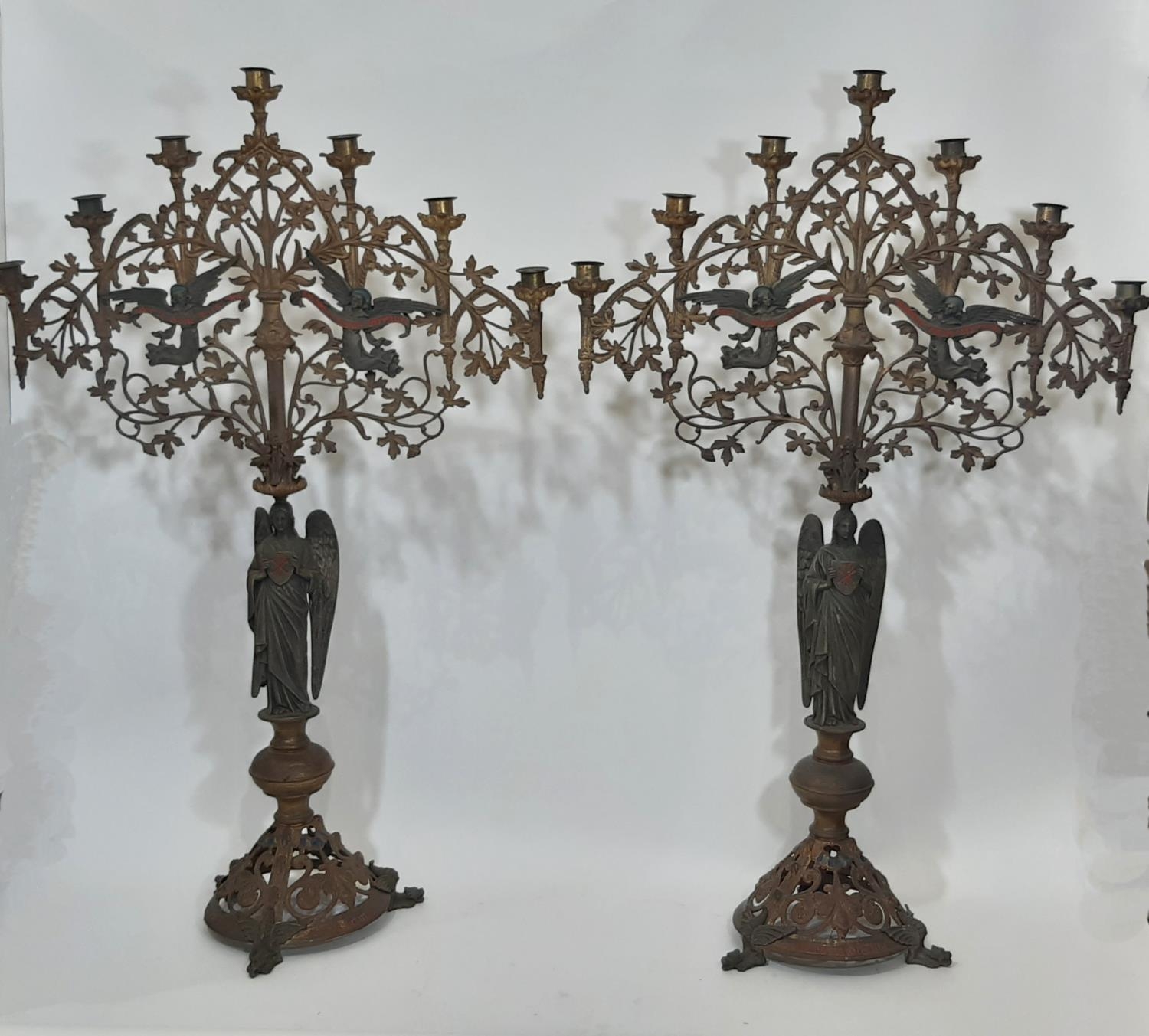 A substantial and impressive pair of 19th century seven-light ecclesiastical enamelled brass