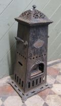A late 19th century French Thermoidore room heater in square tapering cast iron and steel frame,