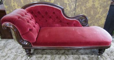 A Victorian chaise with carved mahogany frame