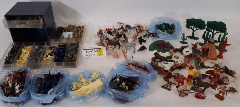 A large quantity of vintage plastic toy figures soldiers including miniature soldiers sorted by