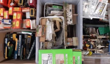 A large collection of 00 gauge railway modellers workshop materials including, diesel train parts,