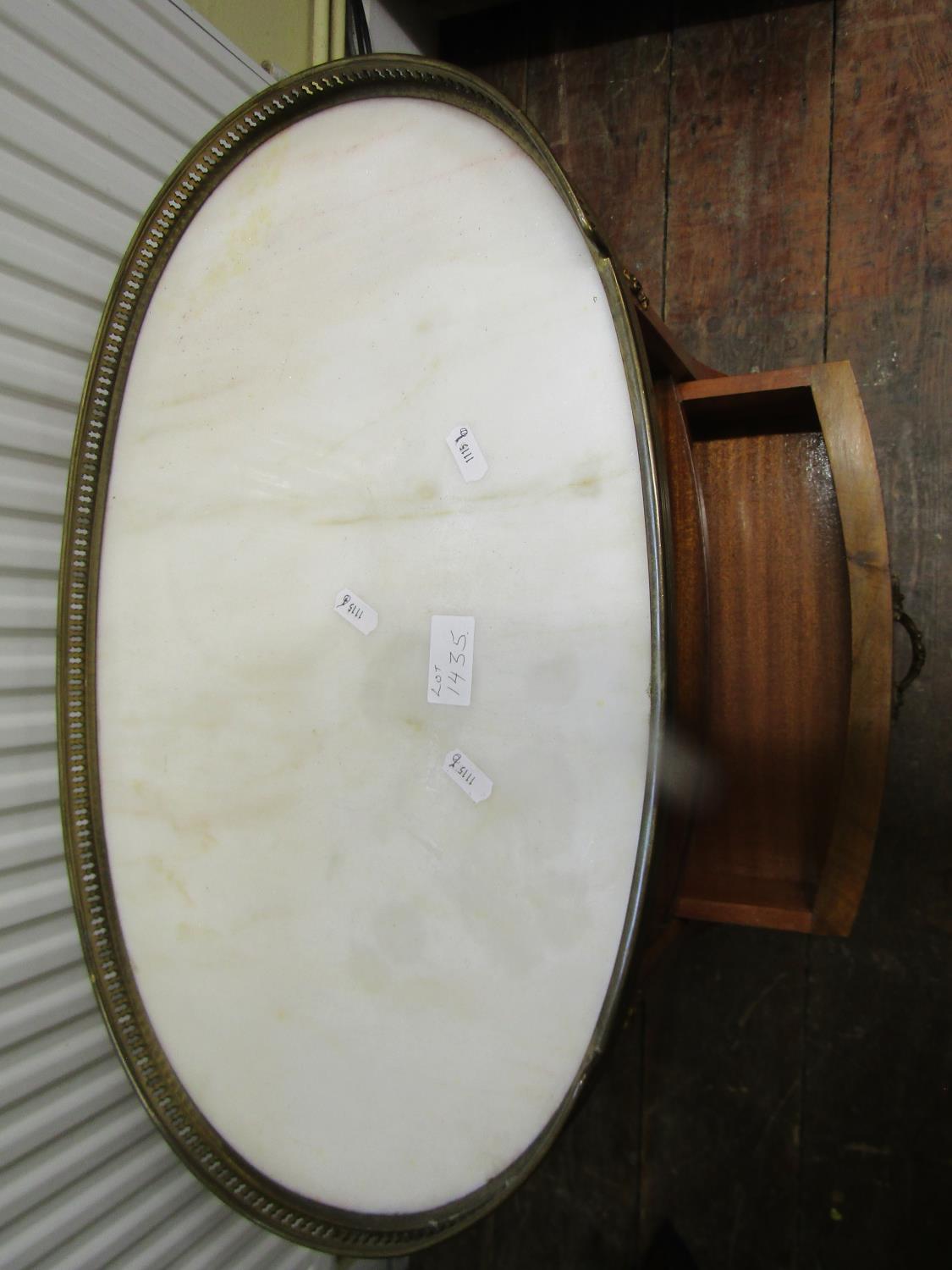 A French 18th century style oval top bedside table with open centre over a single drawer beneath a - Image 2 of 3