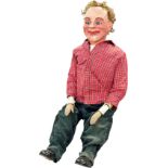 A Ventriloquist Dummy, with working mouth and eyes, 90cm tall approximately.