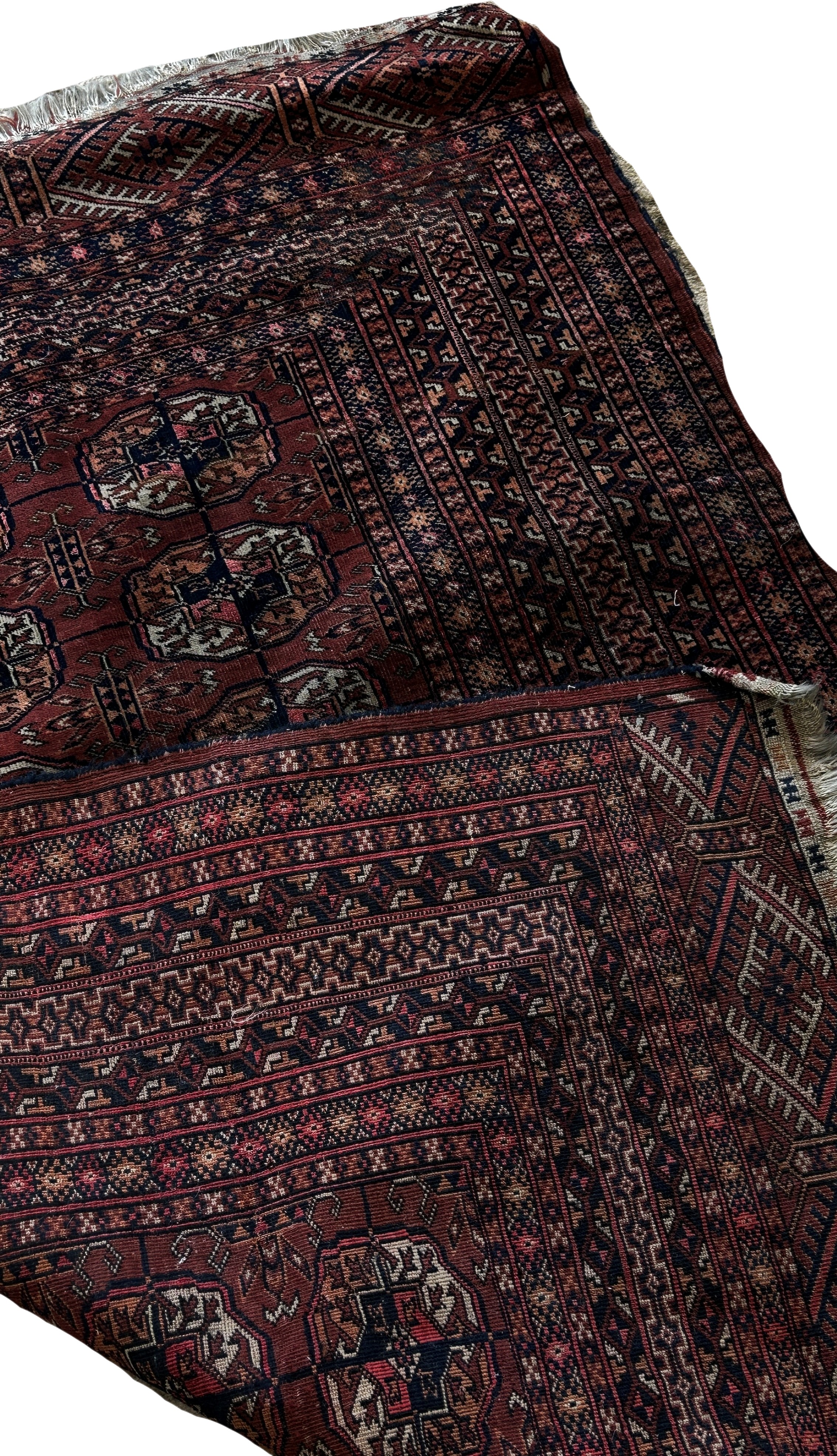 A Bokara Tekke rug with two rows of elephant foot guls on a red ground, 147cm x 103cm approximately - Image 3 of 3